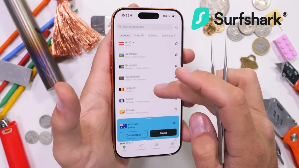 JerryRigEverything shows the Surfshark app on his bench in an iPhone 17 durability test, September 2025